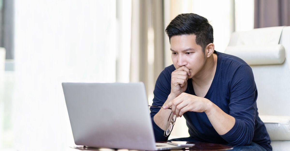 Man looking at a laptop screen