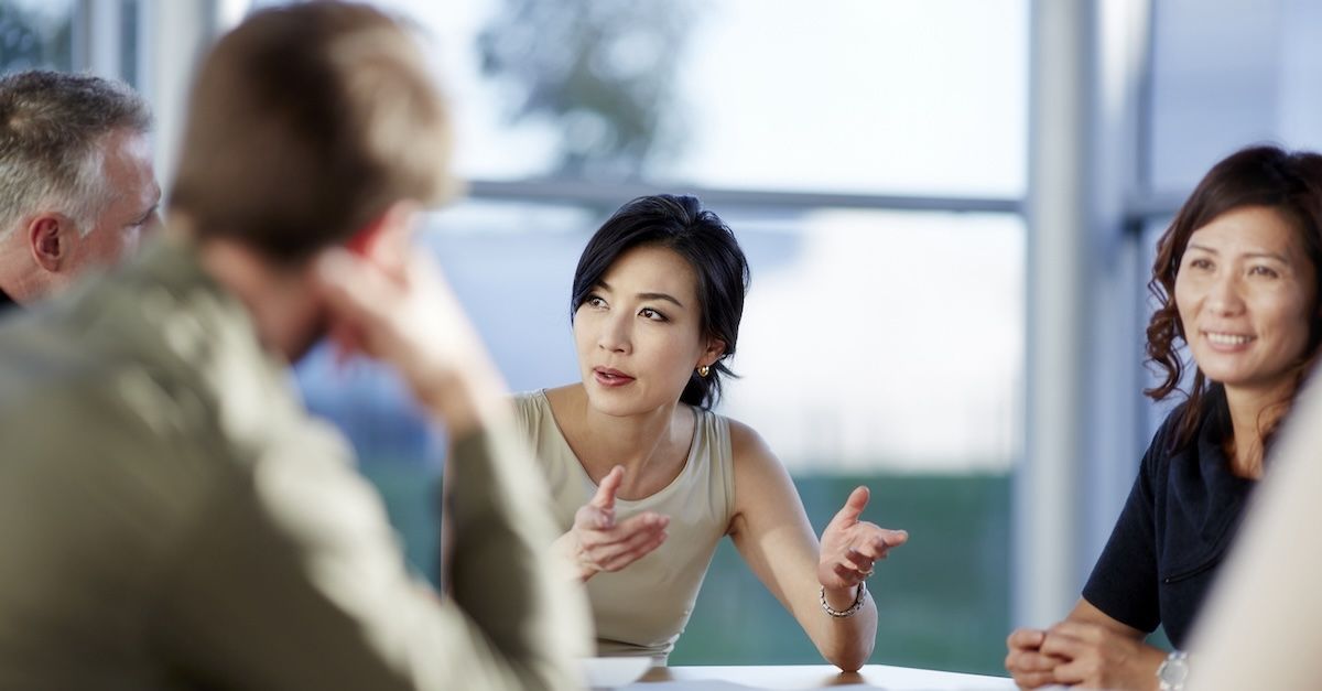 group in conversation during a meeting