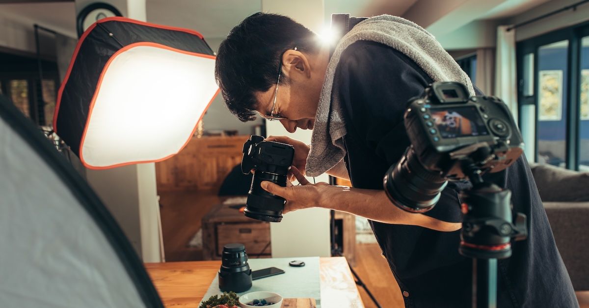 Photographer with camera during a photography session