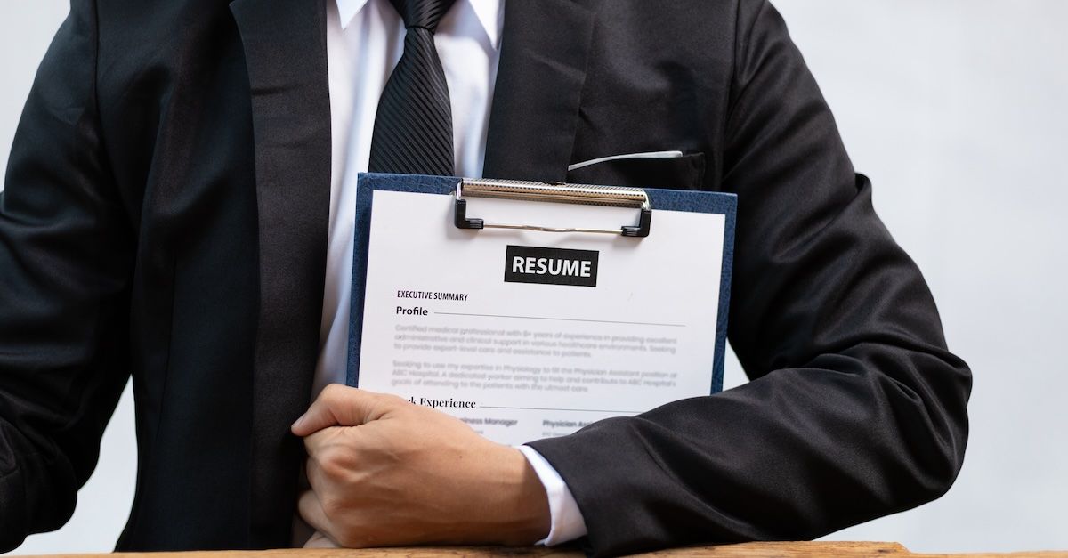 Man holding resume