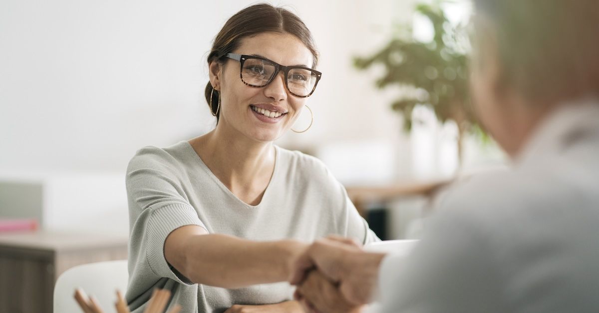 woman giving handshake