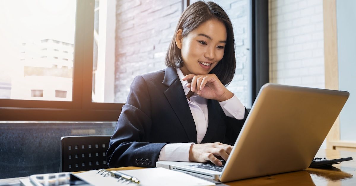 Business woman on laptop at a desk