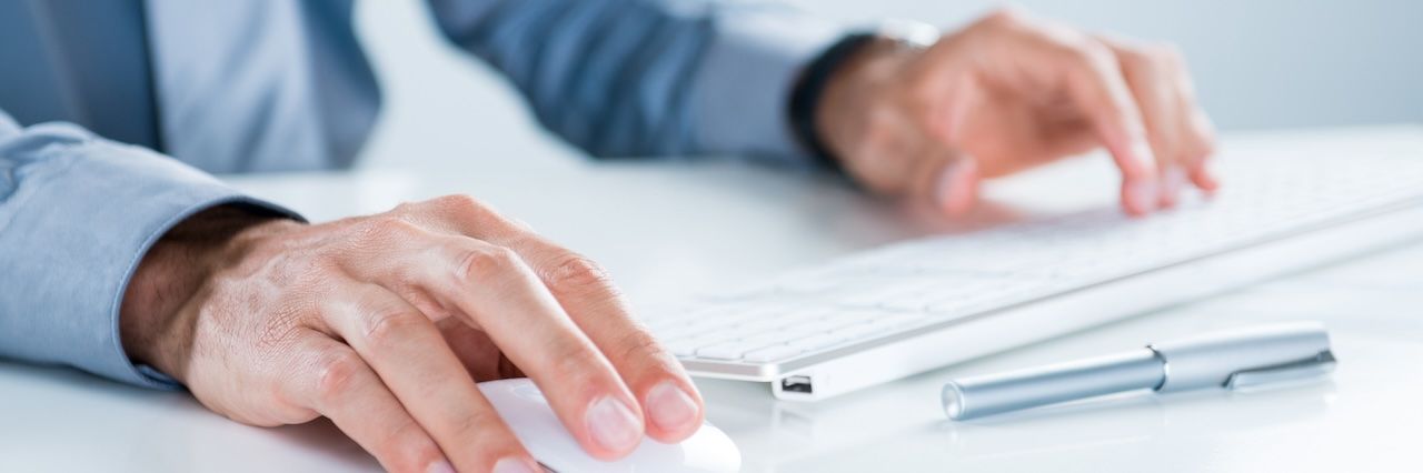 hands on keyboard and mouse