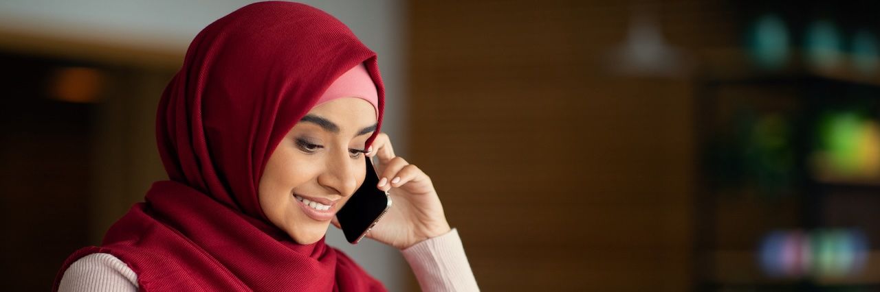 Muslim woman on the phone