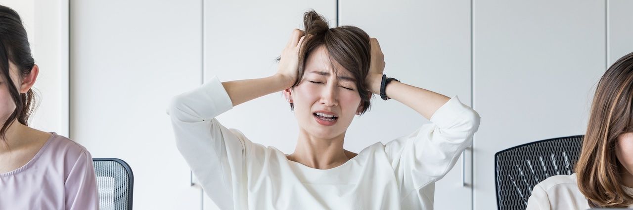 frustrated woman at desk