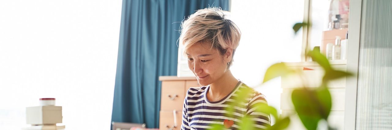 Woman with short hair smiling