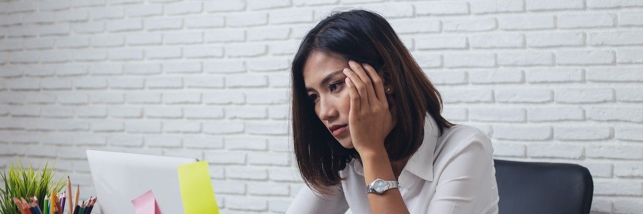 Woman at work stressed with challenges