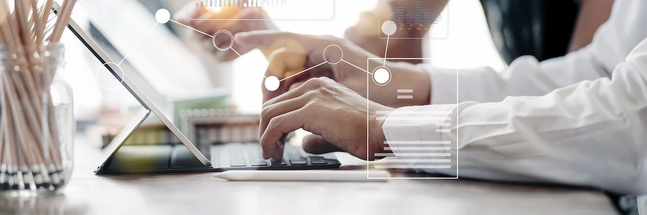 Man on a tablet creating a resume