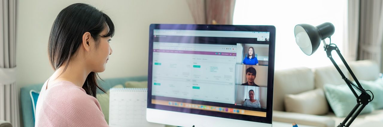 woman working from home in a online meeting