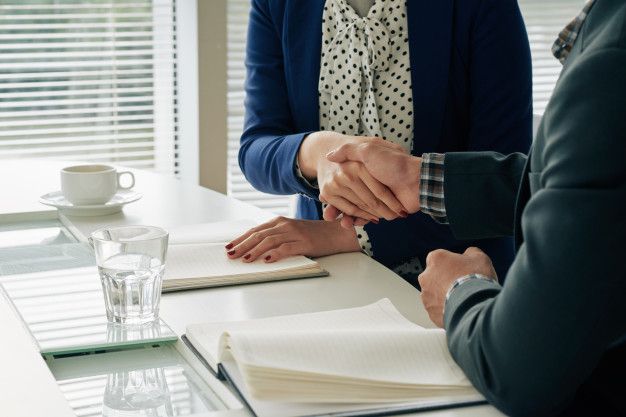 shaking hands after a job interview