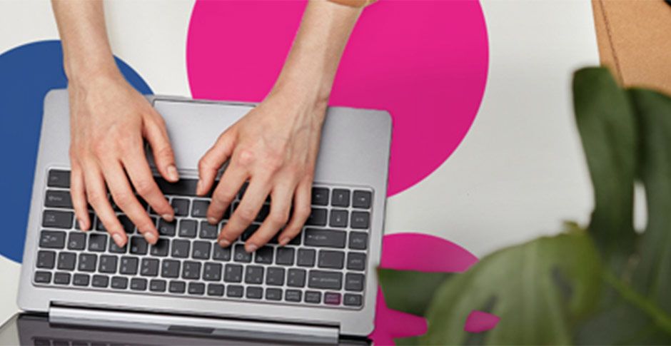 writing an email on laptop